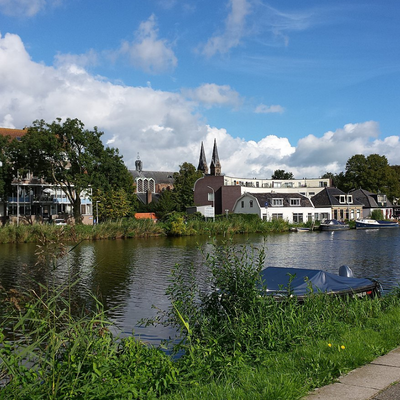 Foto water met boot in Amstelhoek