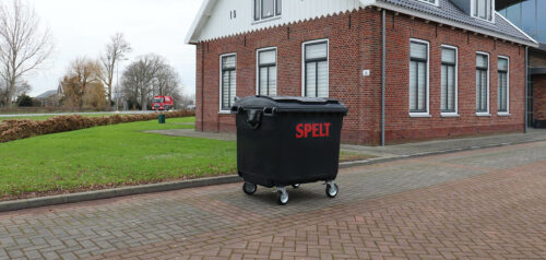 spelt rolcontainer Spelt rolcontainer voor een huis, op straat